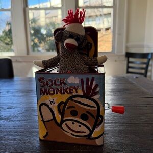 2008 Schylling Sock Monkey Jack in the Box Music Tin Plays Pop Goes the Weasel